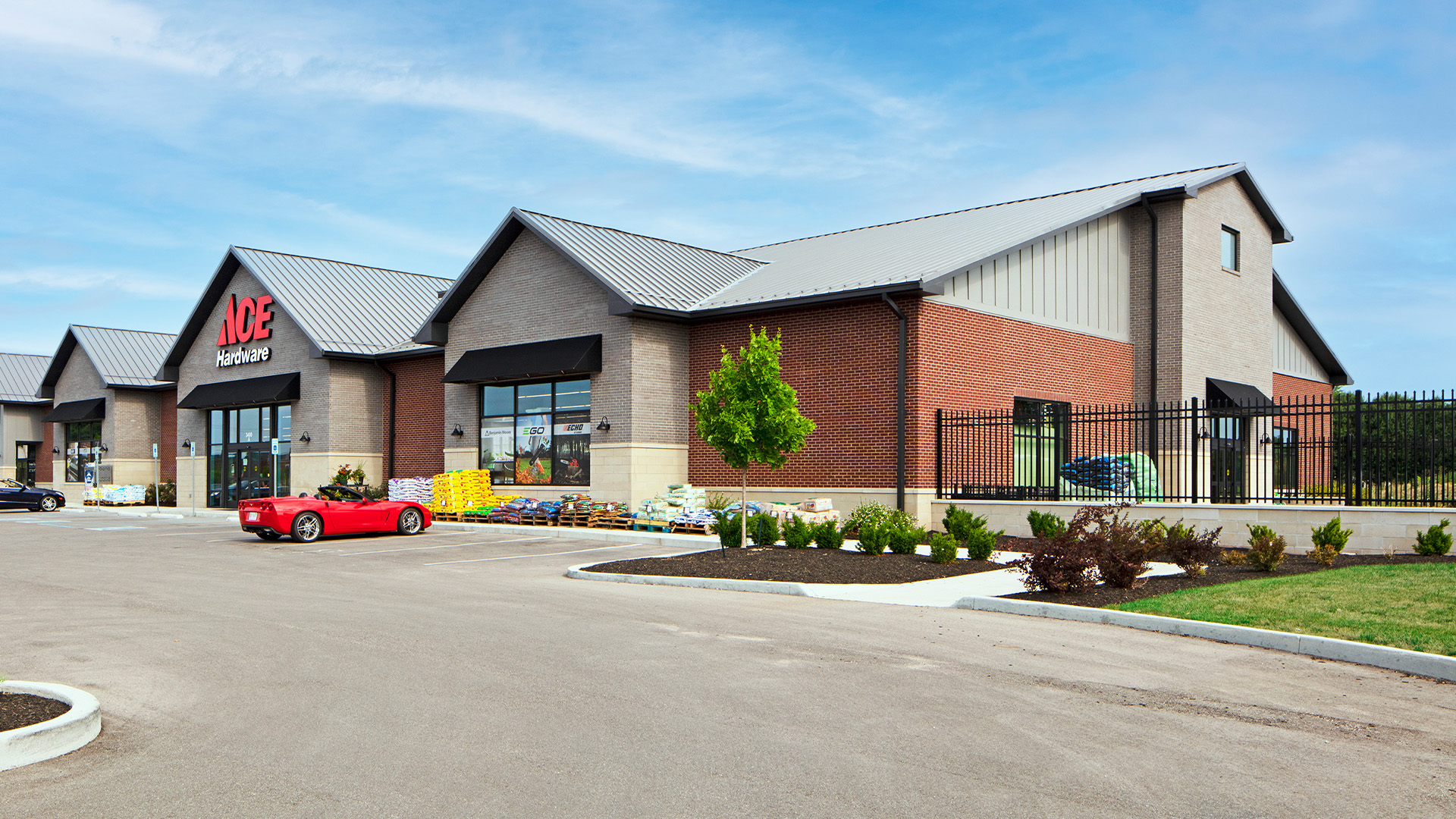 front of business and parking lot of the Benge's Hardware – Westfield store near SR 32 and Carey Rd in east Westfield, Indiana