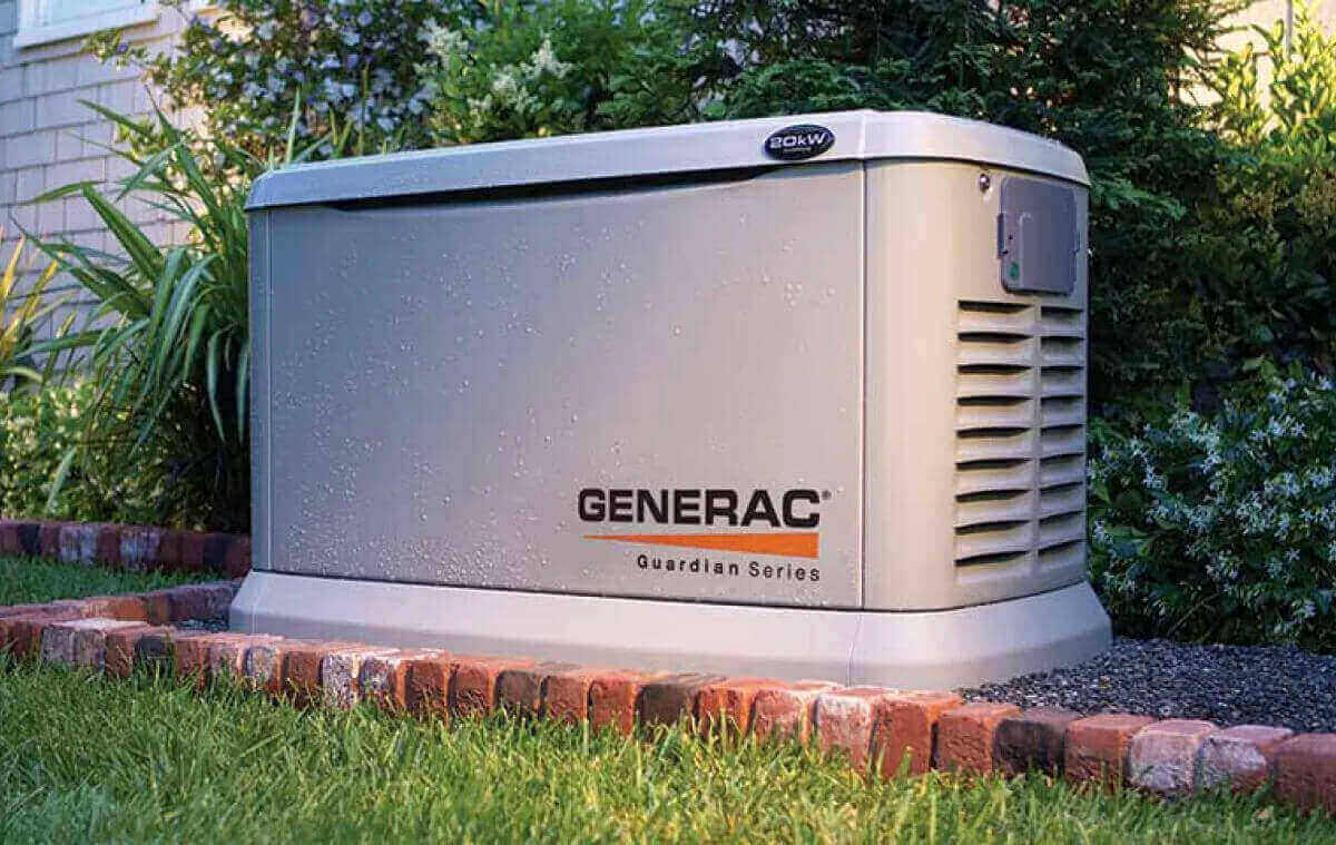 Generac home backup generator on the side of a suburban in central Indiana