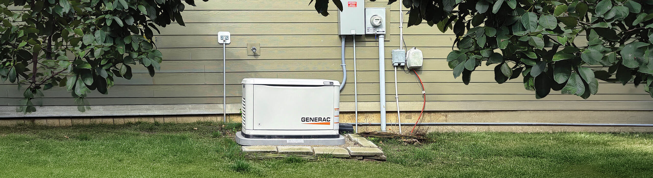whole-home generator installed on the side of a suburban central Indiana home in Noblesville